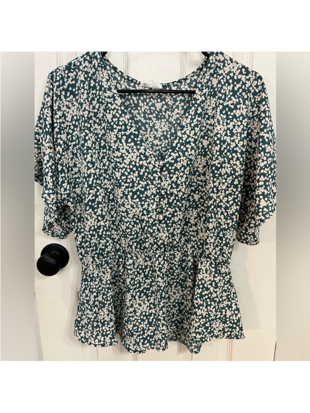Like new 
Greenish and cream color 
blouse flowy around waist